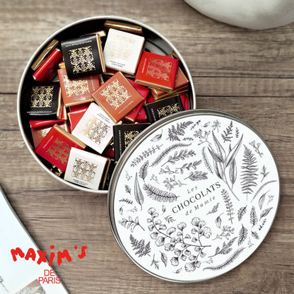 Boite métallique ronde, garnie de chocolats Herbier chouchou photo N° 1