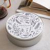 Boite métallique ronde, garnie de chocolats Herbier chouchou photo N° 2