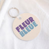 Porte-clés Objets Rond Fleur bleue photo N° 1