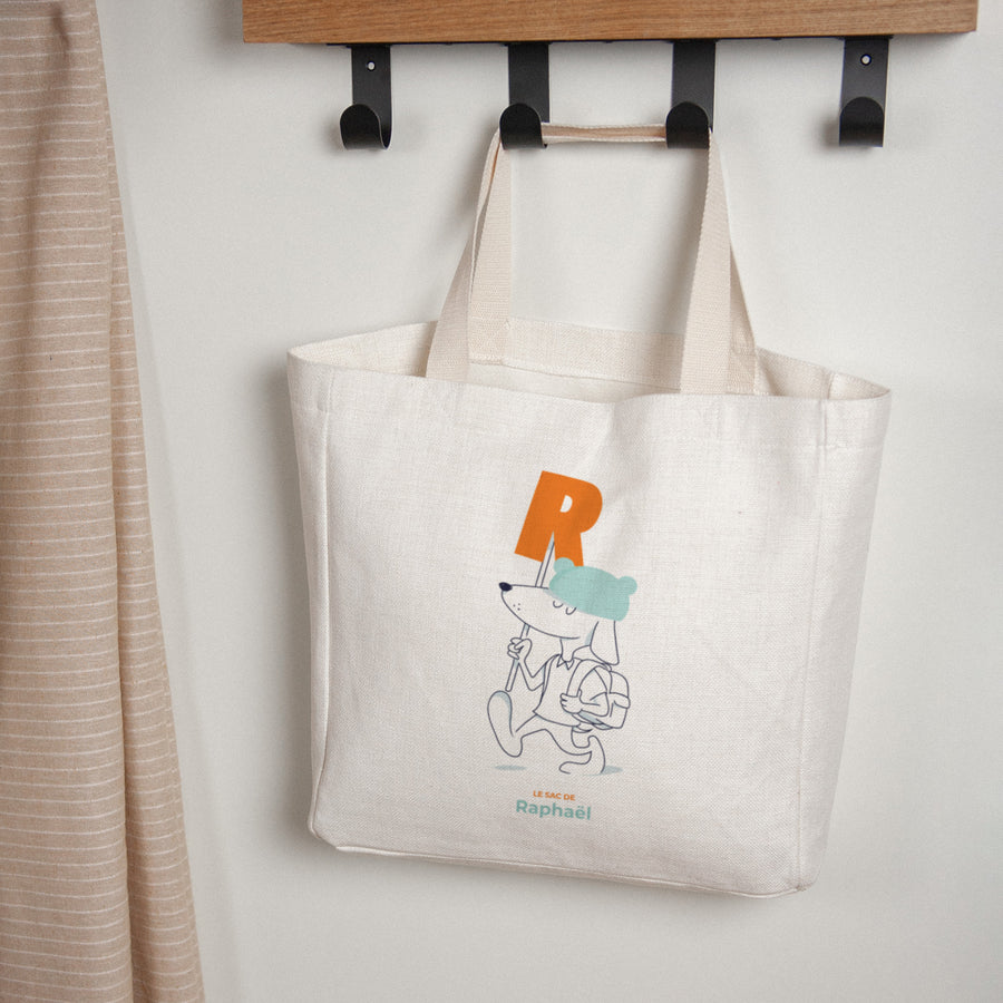 Tote bag Anse en toile Des chiens et des lettres oranges photo