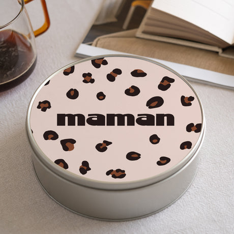 Boite métallique ronde, garnie de chocolats L'iconique
