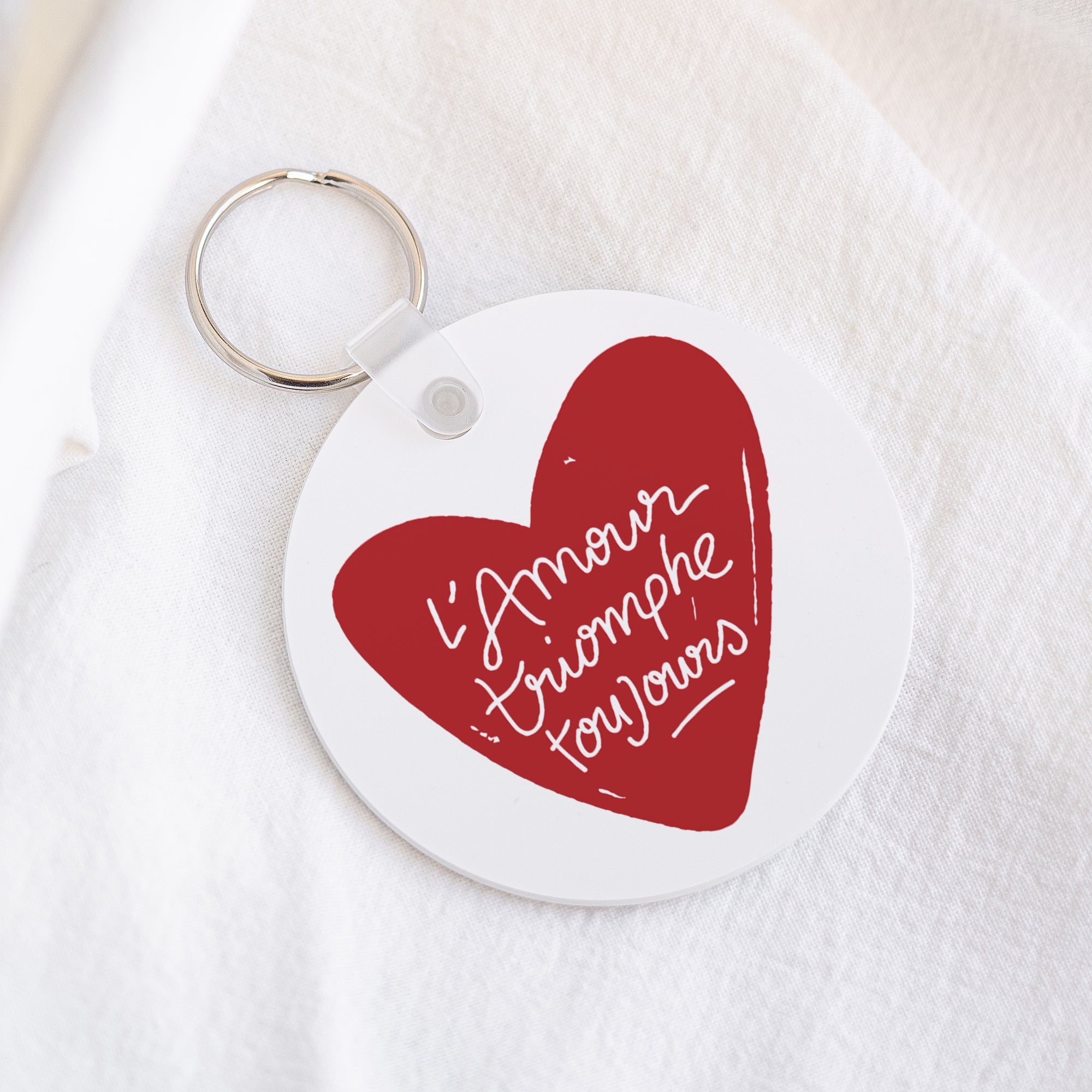 Porte-clés Rond L'Amour Triomphe Toujours photo N° 1